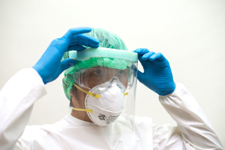 Portrait of man wearing mask
