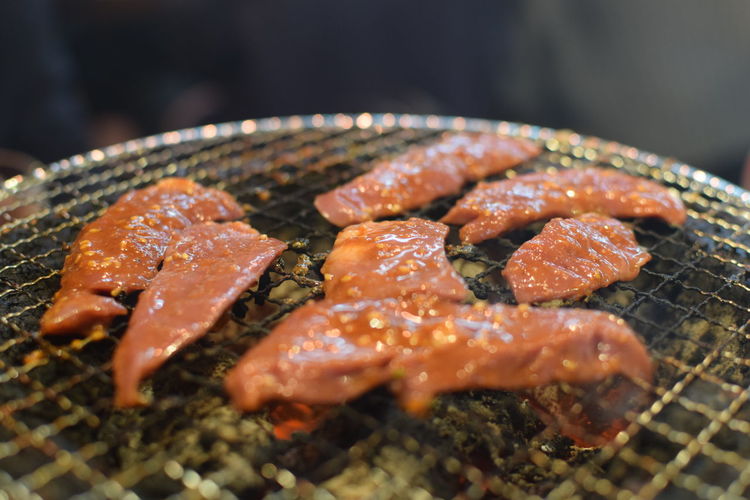 Close-up of meat on barbecue grill