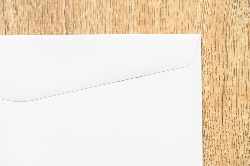 High angle view of white paper on table