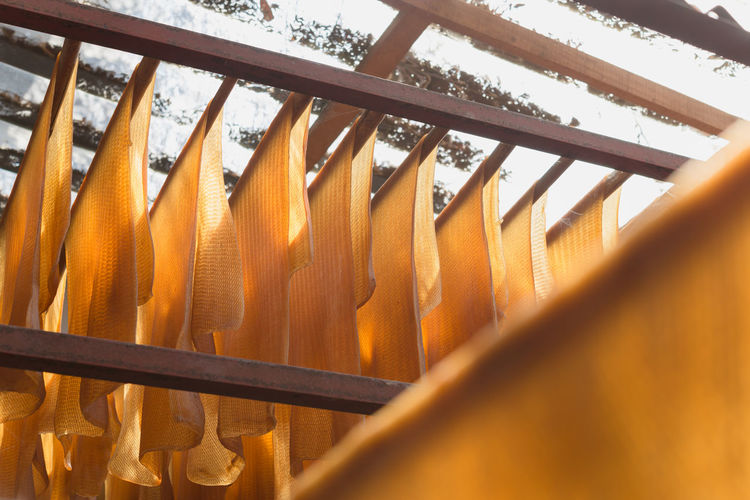 Close-up of railing by window