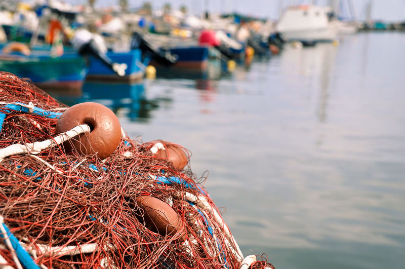 Close-up of fishing net in harbor 