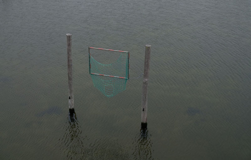 High angle view of soccer ball on lake