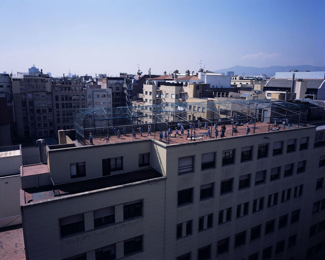 High angle view of children playing on building terrace