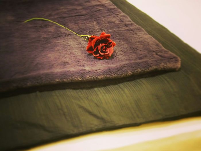 Close-up of red object on table