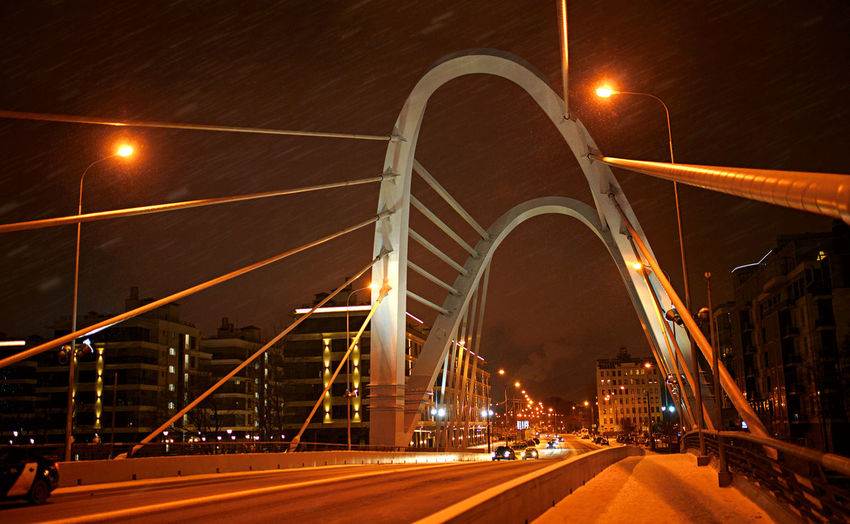 Light trails on bridge at night