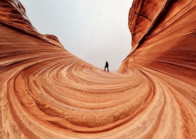 Man standing on rock formation