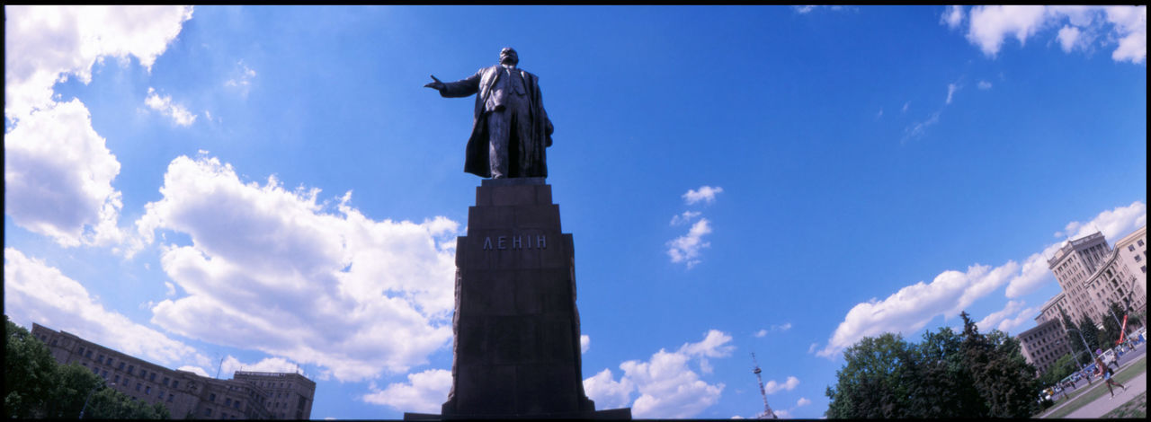  statue of vladimir lenin on high pedestal