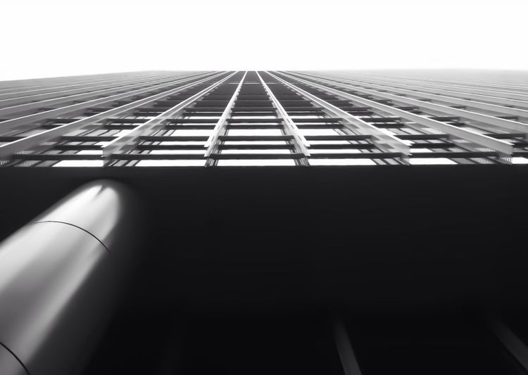 Low angle view of metallic structure against sky