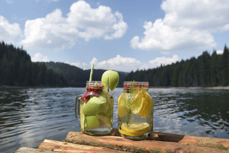 View of drink on lake against sky