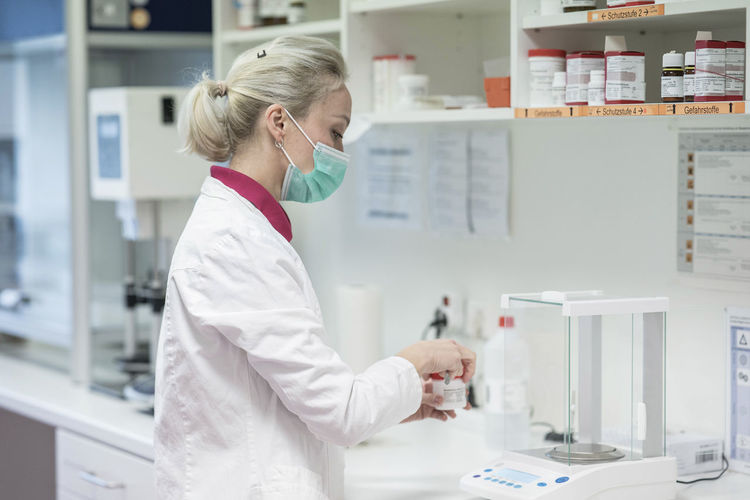 Scientist making medicine in laboratory