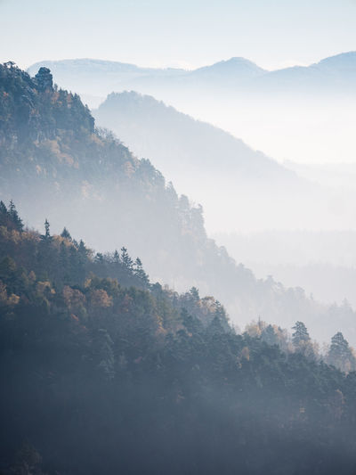 Beautiful misty sunset in hilly landscape. nature travel and adventure concept