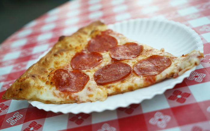 Close-up of pizza slice in plate