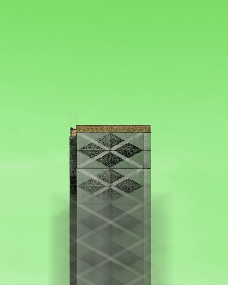 Digital composite image of glass against wall