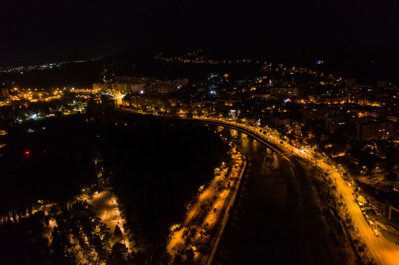 High angle view of illuminated cityscape at night