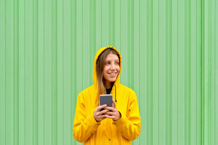 Young woman using mobile phone
