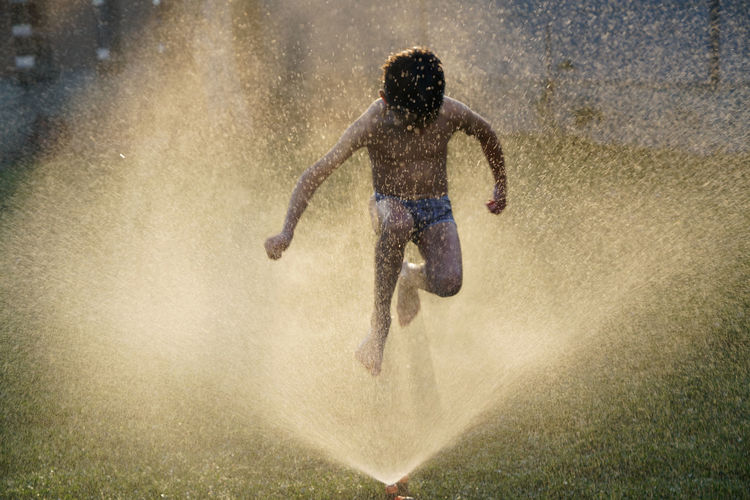 Man jumping in water