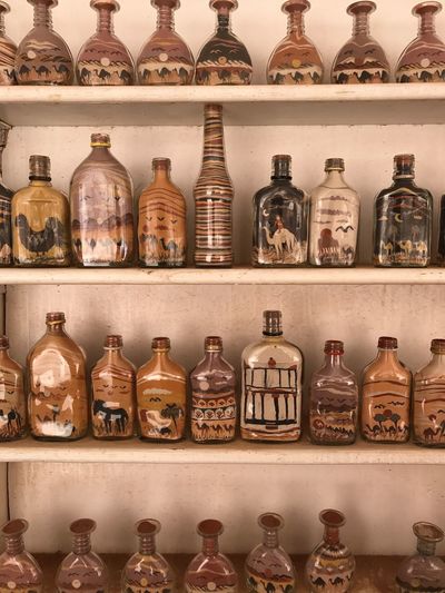 Close-up of bottles on shelf