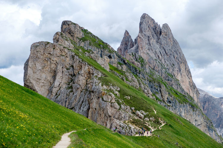 Mount seceda and eastern slopes in a beautiful summer morning, val gardena, dolomites, italy.