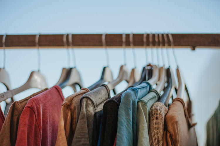 Close-up of clothes on rack
