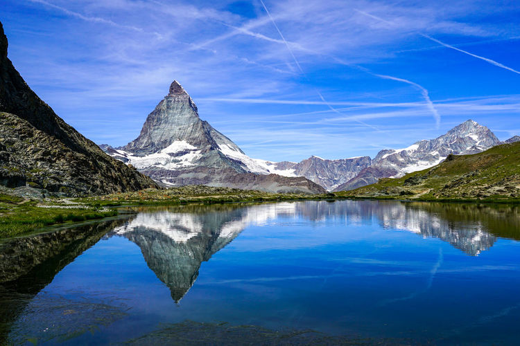 Beautiful reflection of the mattarhorn in the small lake riffelsee.