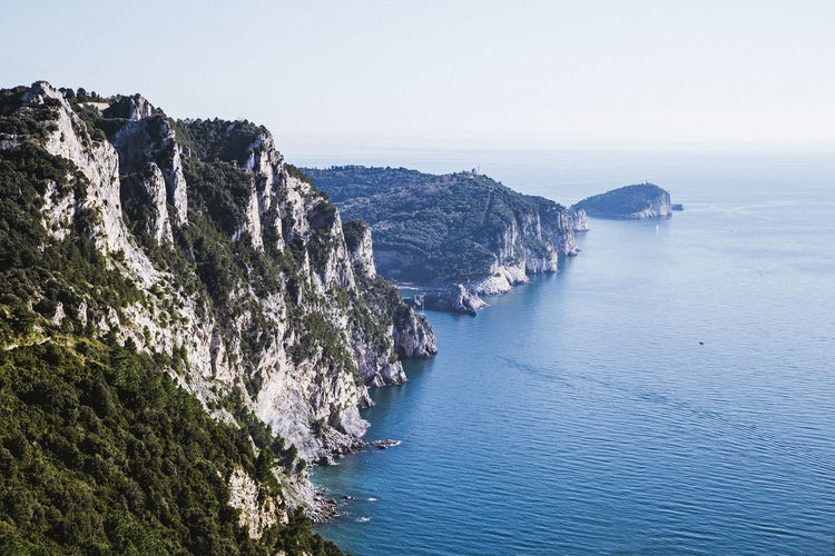 Mediterranean sea against cinque terre high cliff, poet gulf, portovenere, la spezia, italy