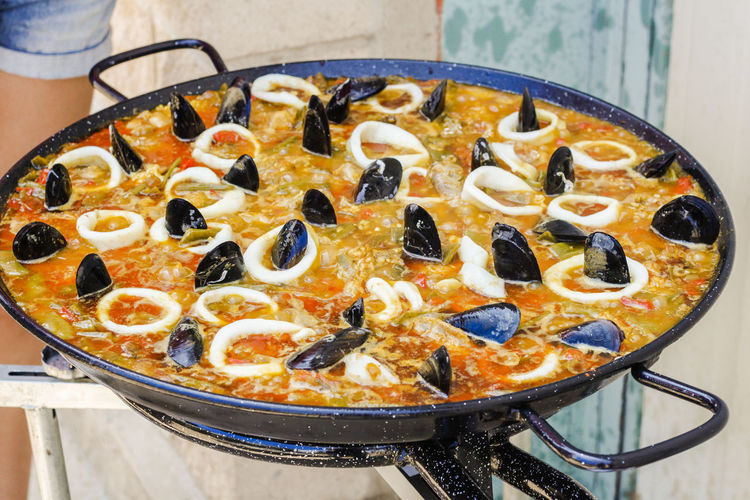 Typical spanish seafood paella in a stove