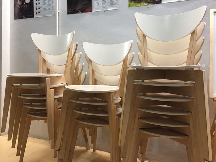 Empty chairs and tables in cafe