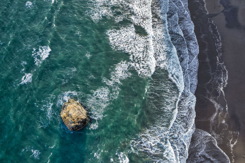 Top view drone image of a sea stack at the oregon coast