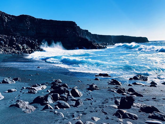 Scenic view of sea against clear sky