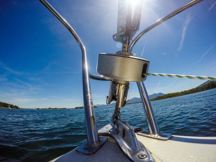 Close-up of yatch pulley against sky
