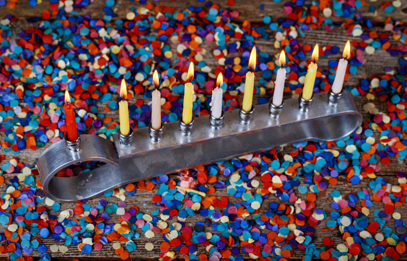 High angle view of multi colored candles
