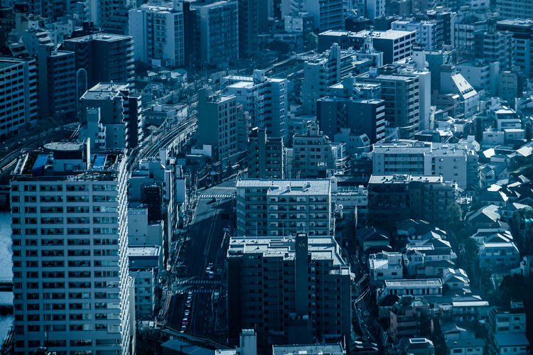 High angle view of modern buildings in city