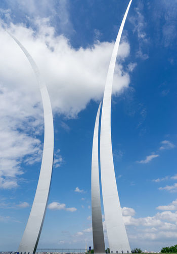 Low angle view of air force memorial against blue sky