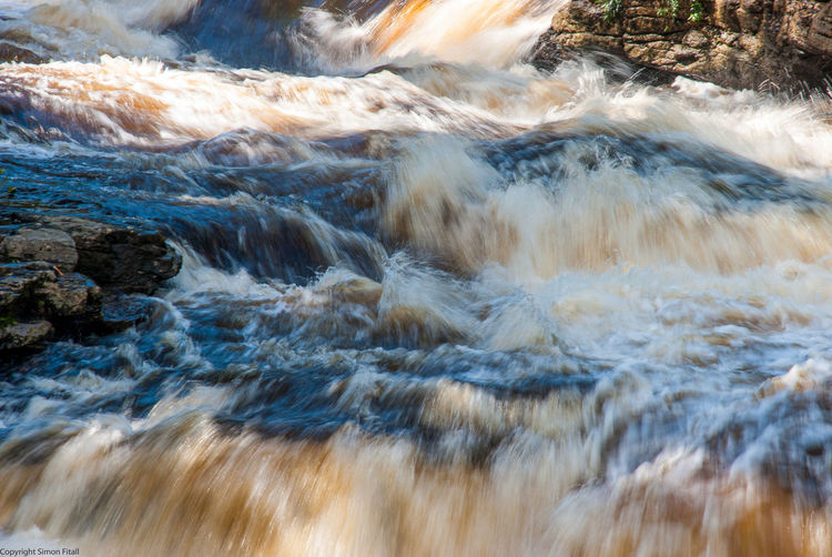Water flowing through rocks