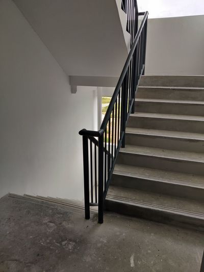 Low angle view of empty staircase against building