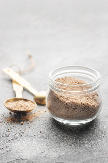 Jar of hickory smoked sea salt. healthy food concept. speciality salt.