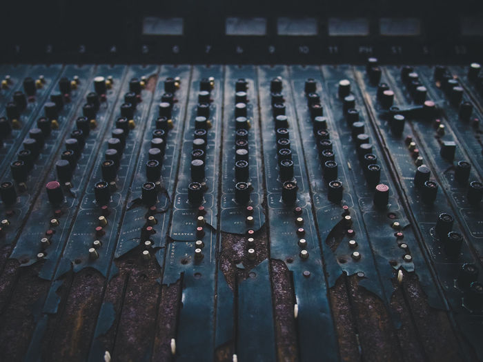 Close-up of rusty sound mixer