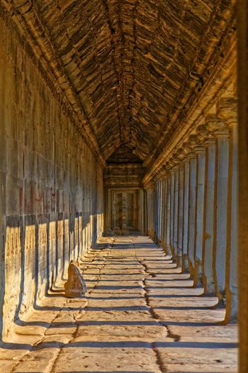 View through corridor of building in angkor wat temple