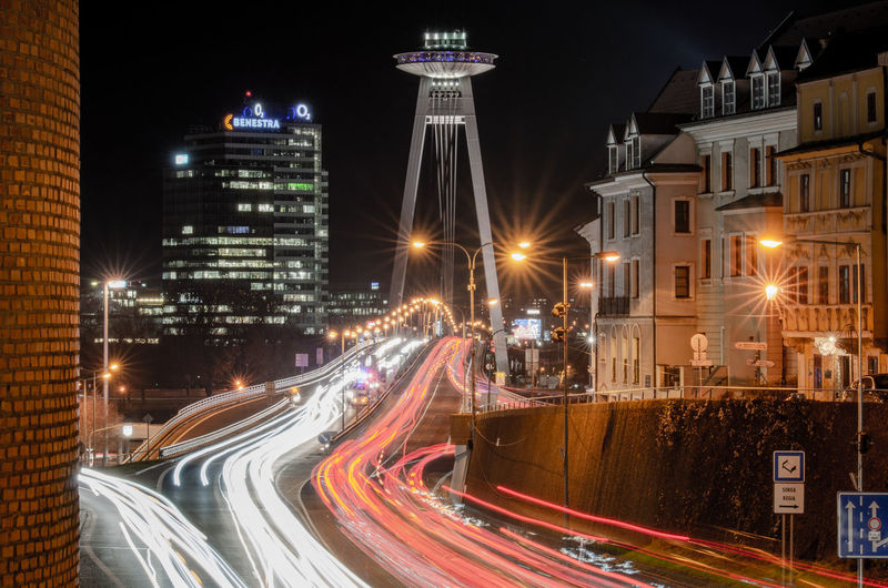 High angle view of light trails on road at night