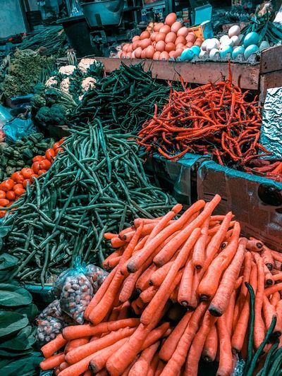 High angle view of various vegetables for sale at market stall