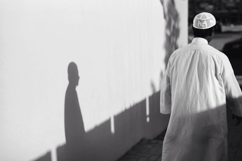 Rear view of man in traditional clothing outdoors