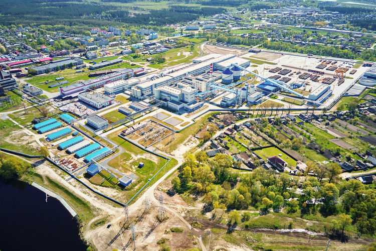 Moder paper factory aerial view. industrial plant in summer day. city landscape