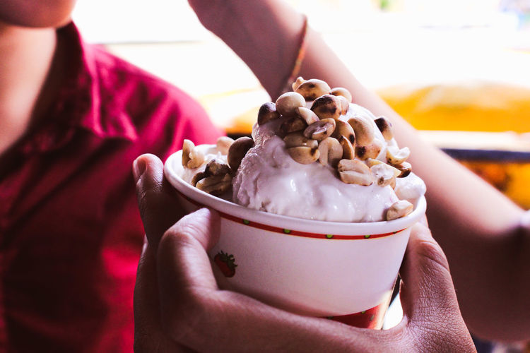 Close-up of people having ice cream