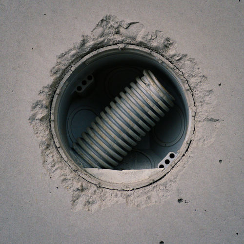 Close-up of pipe in niche
