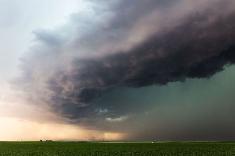 Dramatic thunderstorm clouds roll over a field near dalton, nebraska