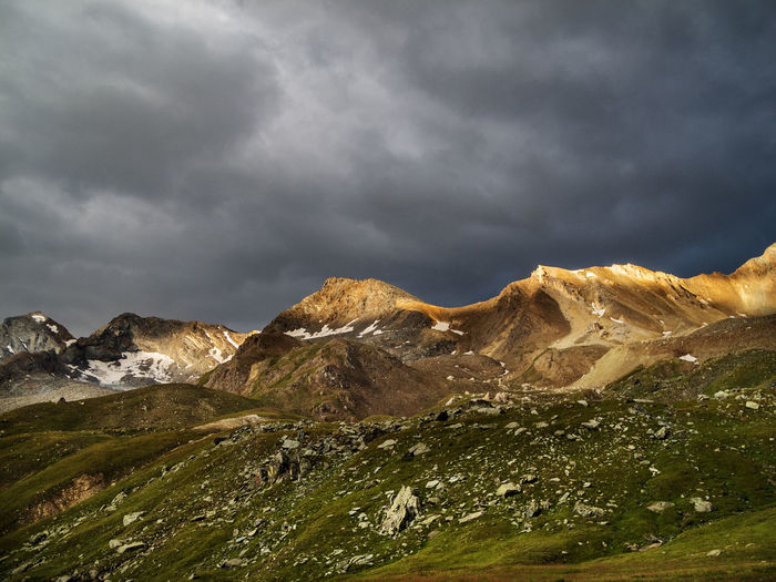 Scenic view of snowcapped mountains against sky