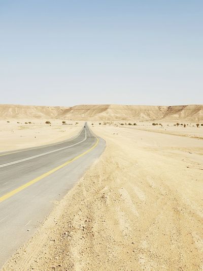 Scenic view of road against clear sky