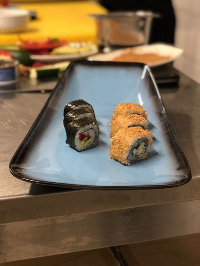 High angle view of sushi served in plate on table