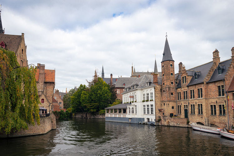 Scenic view from rozenhoedkaai, one of the most famous tourist attractions in the  city of bruges