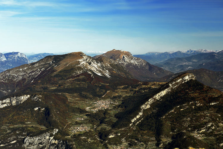Bondone mountains and valley panorama in autumn, trentino, italy